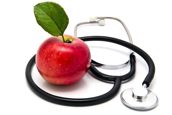 стетоскоп і яблуко